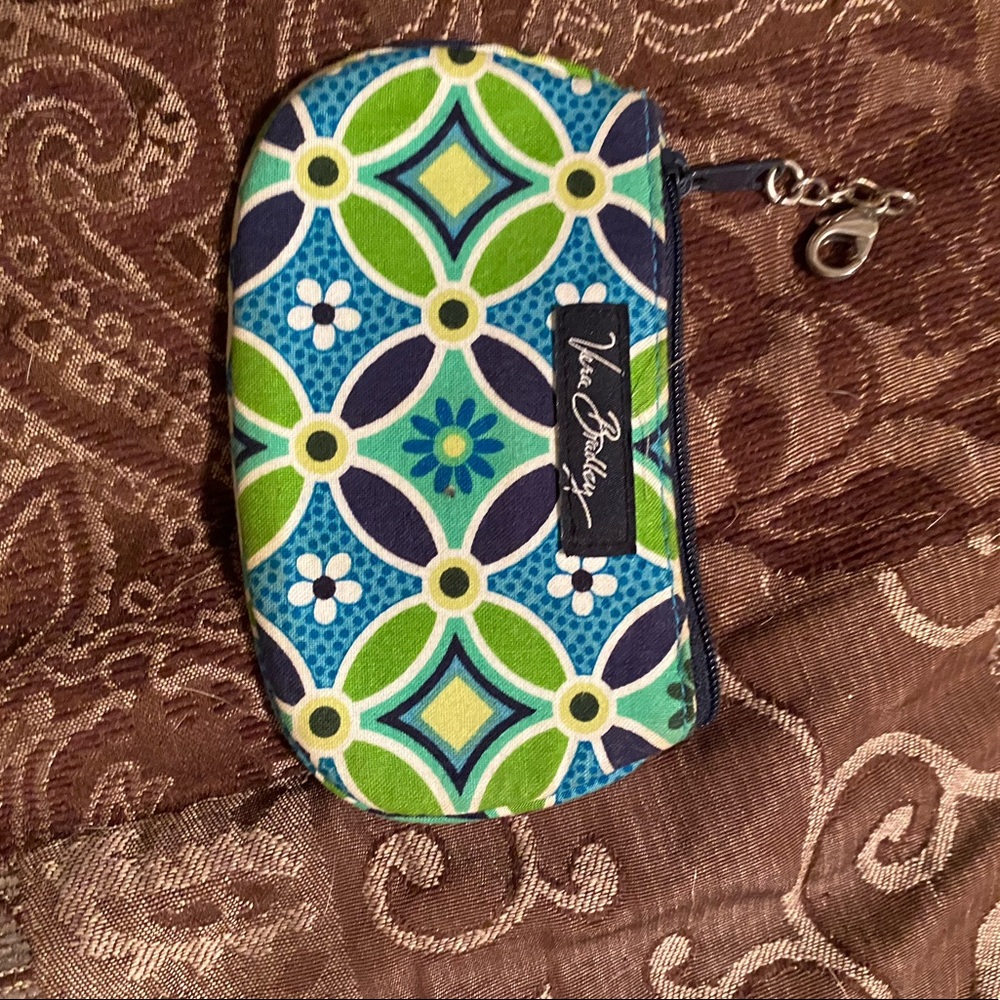 Teal and green Vera Bradley ID carrier.